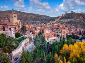 photo of summer view of Teruel with landmarks (Cathedral of Santa María de Mediavilla, Mausoleum of the Amantes) in Aragon, Spain.