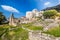 Photo of Kruje Castle and its fortress with the walls and mountains in the background, Albania.