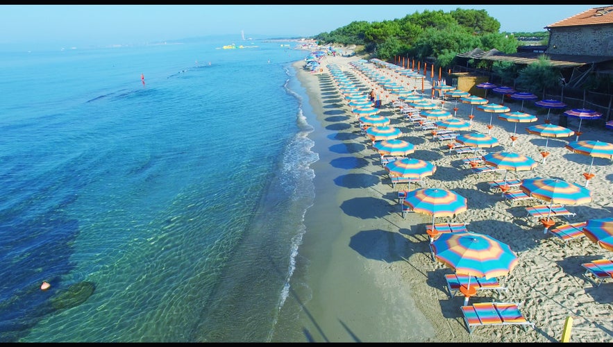 Overhead view of Beach Umbrellas along the coast.