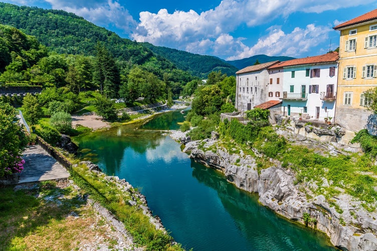 Kanal or Kanal ob Soč relaxing and small Slovenian village with a springboard to dive from the bridge. Small beach on the river with a view of the village from above. Slovenian landscapes. Nova Gorica