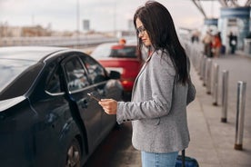 Einkabíla flutningur frá Kraká flugvelli með rafmagnsbíl