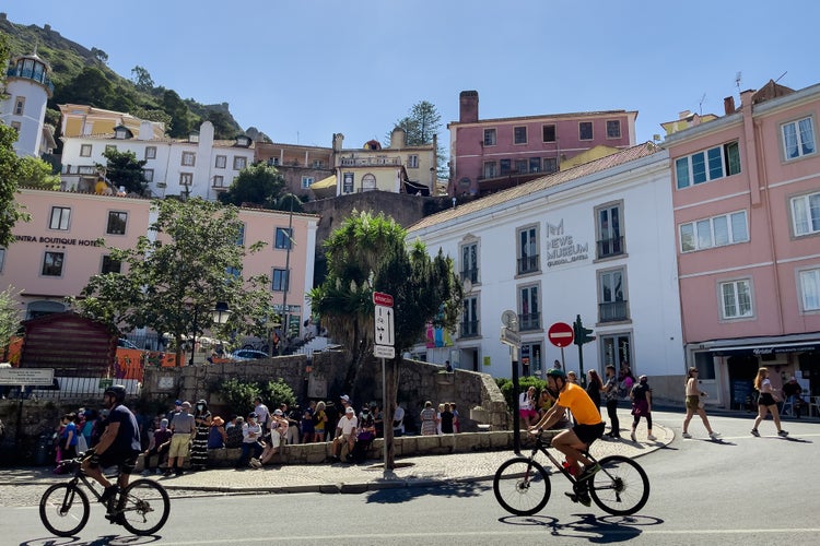 Cyclists riding their bikes on road in Sintra.jpg