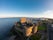 Carrickfergus Castle and Marina on Background Aerial view. Coastal Route in Northern Ireland.