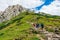 A view of the peaks Small Giewont and Giewont. Majestic mountain landscape in Tatras. Zakopane, Poland. Trekkers discover the world. Active lifestyle, sport and tourism.