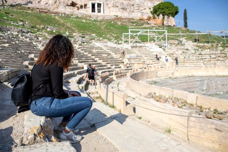 photo of Theatre of Dionysus at the foot of Acropolis in Athens, Greece. It is one of the main landmark of Athens. Scenic panorama of ancient Greek ruins of Theatre of Dionysus.,Athens Greece.