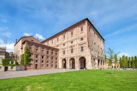 Photo of panorama of Parma cathedral with Baptistery leaning tower on the central square in Parma town in Italy.