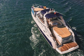 Benagil private yacht from lagos with drinks, tapas, paddle boards and kayak 