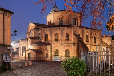 photo of view of Ravenna, Italy at the historic Basilica of San Vitale in the evening.