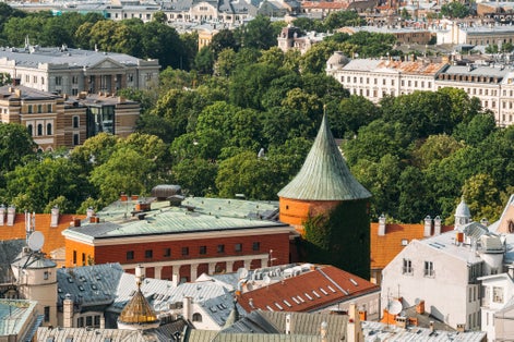 photo of aerial view of Riga, Latvia. Riga cityscape in sunny summer day. Famous landmark - Powder tower now part of latvian war museum.