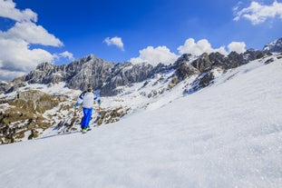 photo of the romantic, Snow covered Skiing Resort of Cortina d Ampezzo in the Italian Dolomites seen from Tofana with Col Druscie in the foreground.