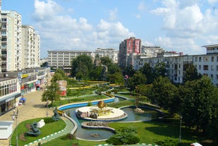 Antique building view in Old Town Bucharest city - capital of Romania and Dambrovita river. Bucharest, Romania, Europe.