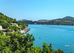 Photo of panoramic aerial view of the old town of Dubrovnik, Croatia seen from Bosanka viewpoint on the shores of the Adriatic Sea in the Mediterranean Sea.