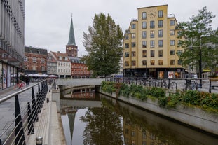 Photo of the harbour of Esbjerg, historical water tower in the background, Jutland, Denmark.