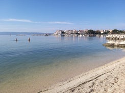 Photo of aerial view of Stobrec popular touristic destination on Adriatic sea, suburb of city of Split, Croatia.