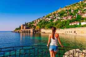 Photo of Kizil Kule or Red Tower and port aerial panoramic view in Alanya city, Antalya Province on the southern coast of Turkey.