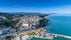 Photo of Aerial view of the white tall apartment buildings of the coast of Chioggia in Italy.