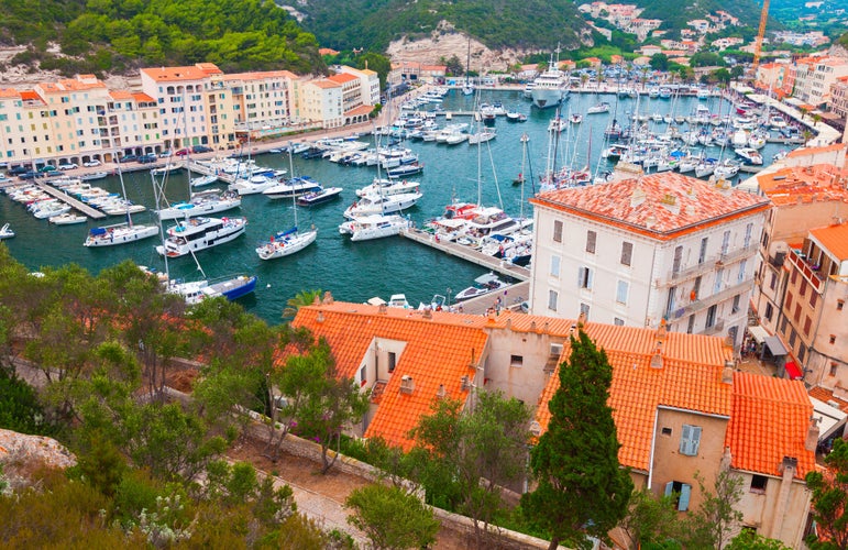 Bonifacio, Corsica, Inner harbor view with sailing and motor boats.