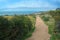 Photo of Es Carnatge path and view over Palma bay in springtime sunhaze ,Spain .