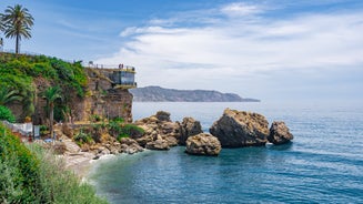 Photo of aerial view of beach in Nerja, Malaga province, Costa del Sol, Andalusia, Spain.