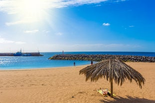 Photo of beach aerial view of Machico bay and Cristiano Ronaldo International airport in Madeira, Portugal.