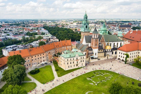 Photo of aerial view of The Wawel Royal Castle, a castle residency located in central Krakow. Wawel Royal Castle and the Wawel Hill constitute the most historically and culturally important site in Poland.