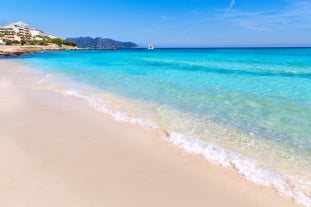 Photo of beautiful sandy beach of Cala Mesquida, Mallorca, Mediterranean Sea, Balearic islands, Spain.