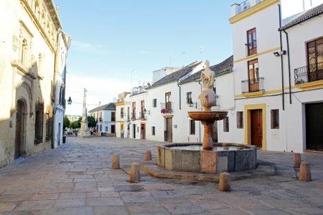 photo of an ancient fountain in Plaza del Potro in Cordoba, Spain.
