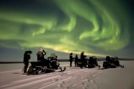 Kiruna: Guided Snowmobile Tour and Northern Lights Hunt