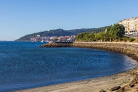 photo of aerial view of a harbor Fisterra is on Cape Finisterre in Galicia, Spain.