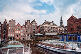 Amsterdam Netherlands dancing houses over river Amstel landmark in old european city spring landscape.