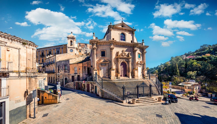 Photo of sunny spring cityscape of Ragusa town with Church Holy Souls in Purgatory, Sicily, Italy.