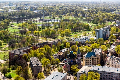 photo of aerial view of Riga cityscape with Uzvaras parks. Latvia.