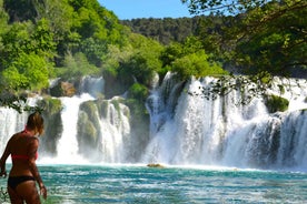 Split: Krka Waterfalls Guided Day Trip with Swim & Boat Tour