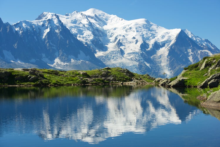 Colorful summer panorama of the Lac Blanc lake with Mont Blanc (Monte Bianco) on background, Chamonix location. Beautiful outdoor scene in Vallon de Berard Nature Reserve, Graian Alps, France, Europe.