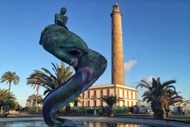 photo of landscape with Maspalomas town and golden sand dunes at sunrise, Gran Canaria, Canary Islands, Spain.