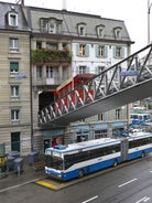 Panoramic view of historic Zurich city center with famous Fraumunster, Grossmunster and St. Peter and river Limmat at Lake Zurich on a sunny day with clouds in summer, Canton of Zurich, Switzerland