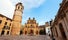 Photo of Wide angle shot of Fadri tower and Gothic Cathedral. Castellon de la Plana, Spain .