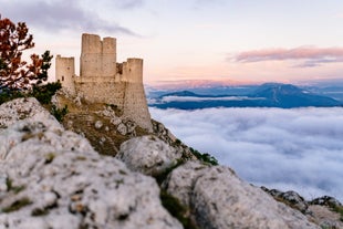 Photo of panoramic view of the ancient town of Matera (Sassi di Matera), European Capital of Culture 2019, in beautiful golden morning light with blue sky and clouds, Basilicata, southern Italy.