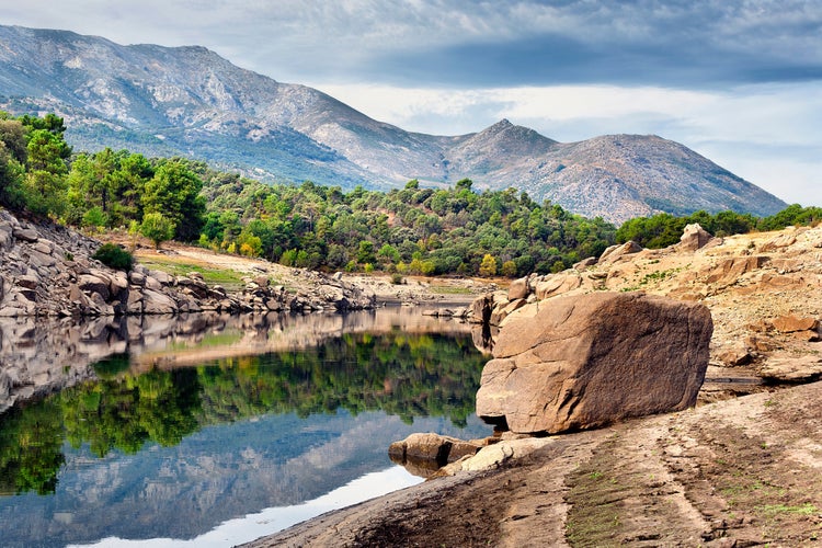 photo of view of Alberche river in Navaluenga and Sierra de Gredos. Avila. Spain.