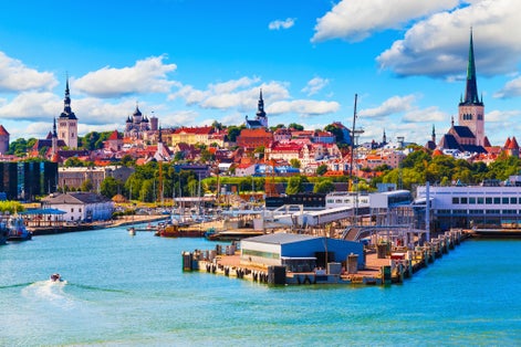 Scenic summer view of the Old Town and sea port harbor in Tallinn, Estonia.