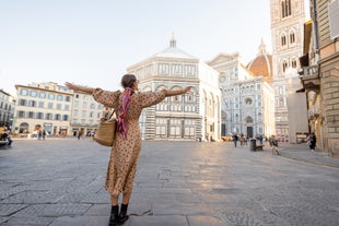 Famous buildings, gondolas and monuments by the Rialto Bridge of Venice on the Grand Canal, Italy.