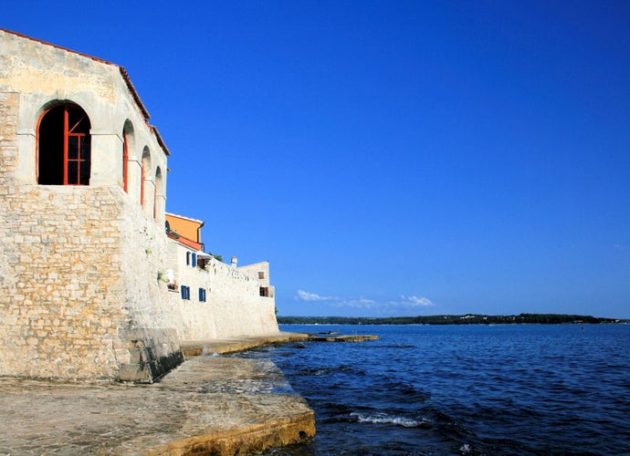 photo of view of old city wall of Novigrad, Istra, Croatia.