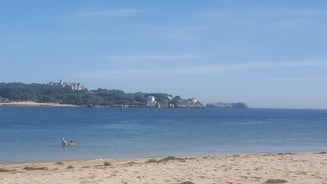 Photo of Santander city beach aerial panoramic view.