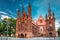 photo of vilnius, Lithuania. View of roman catholic church of st. anne and church of st. francis and st. bernard In old town In summer sunny day. 