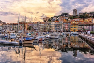 Photo of aerial cityscape view on French riviera with yachts in Cannes city, France.