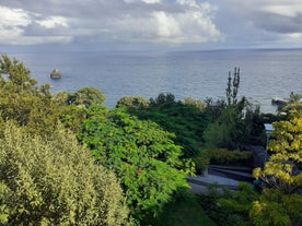 Aerial drone view of Camara de Lobos village, Madeira.