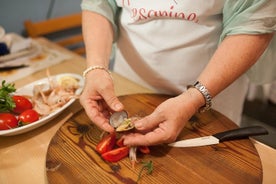 Market visit and cooking class with lunch or dinner at a local's home in Praiano