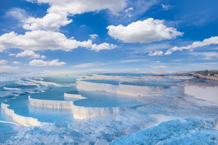 Photo of natural travertine pools and terraces in Pamukkale. Cotton castle in southwestern Turkey, Pamukkale, Denizli.