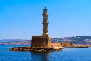 Photo of aerial view of Chania with the amazing lighthouse, mosque, venetian shipyards, Crete, Greece.