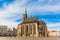 Photo of St. Bartholomew's Cathedral in the main square of Plzen with blue sky and clouds in sunny day, Czech Republic.